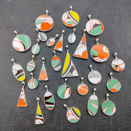Clarice cliff jewellery pendants made from pottery fragments from stoke on trent