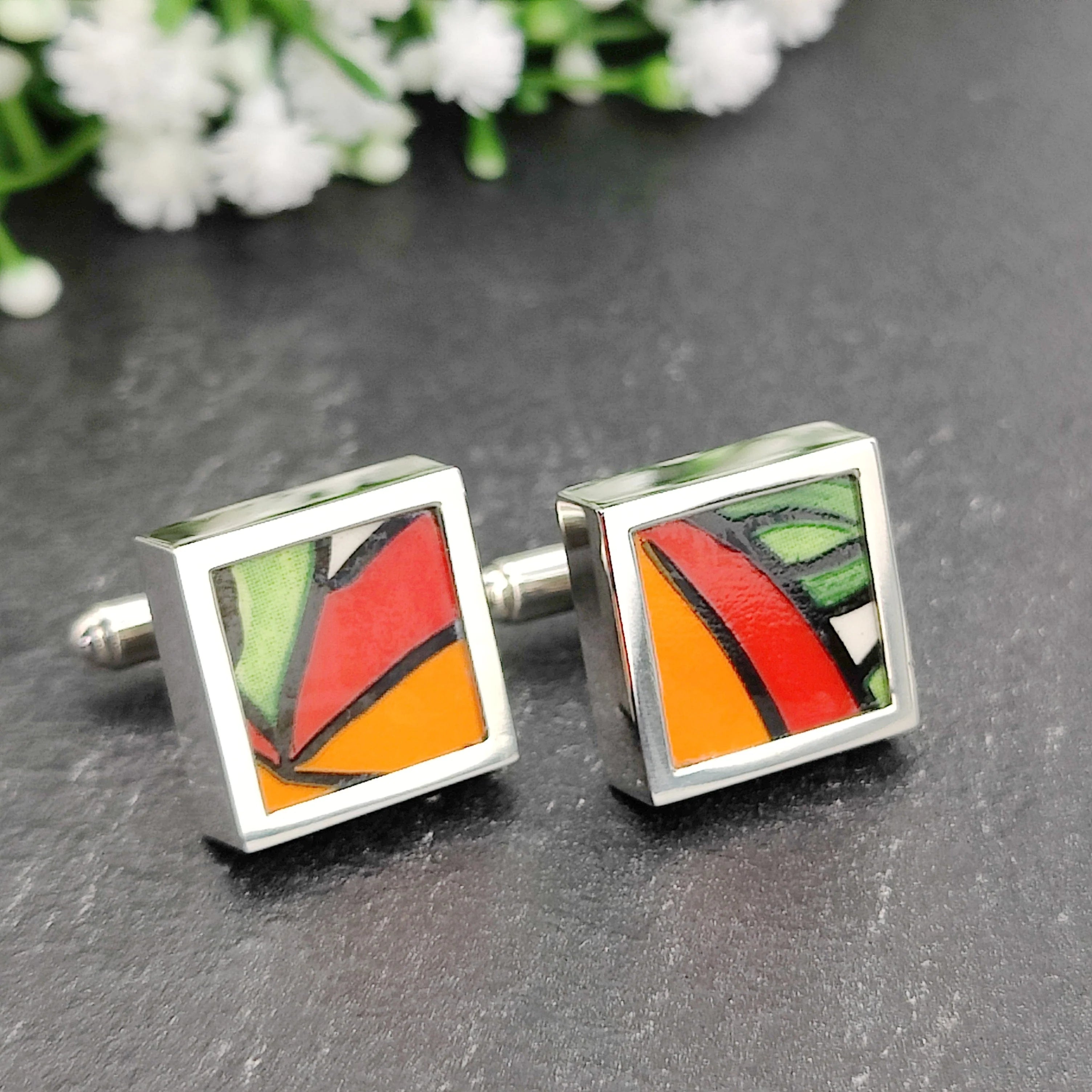 upcycled clarice cliff cufflinks with orange red and green design