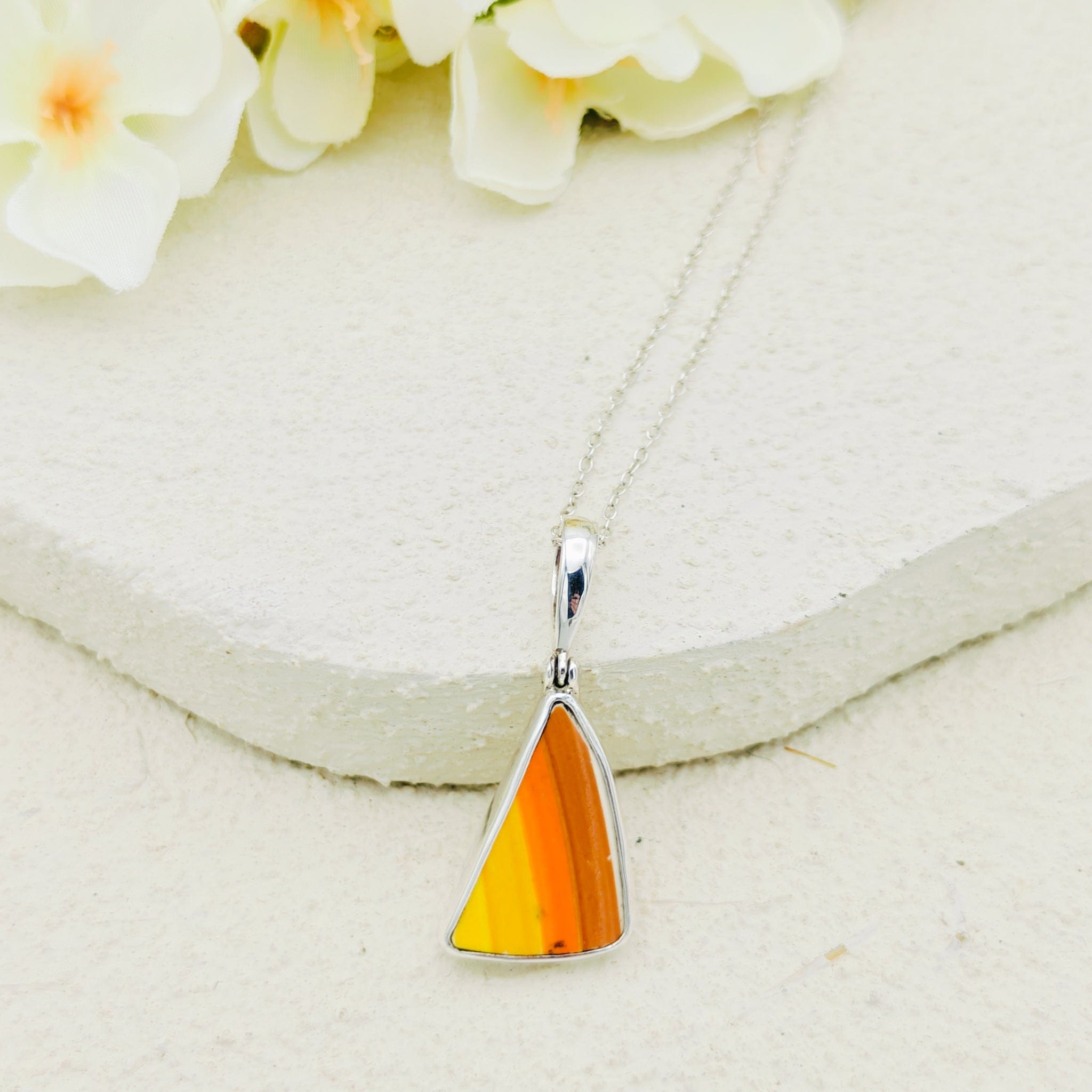 Hepburn and Hughes Original Clarice Cliff Pottery pendant with Striped Triangles in orange and yellow, in Sterling Silver with a silver chain