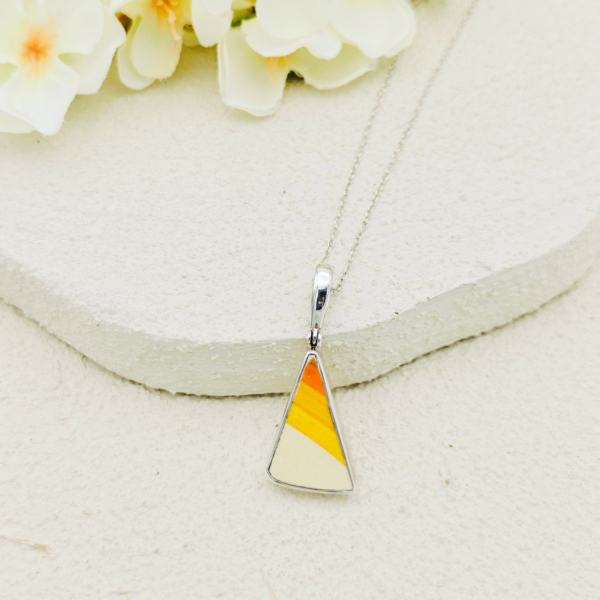 Hepburn and Hughes Original Clarice Cliff Pottery pendant with Striped Triangles in orange, yellow and white, in Sterling Silver with a silver chain
