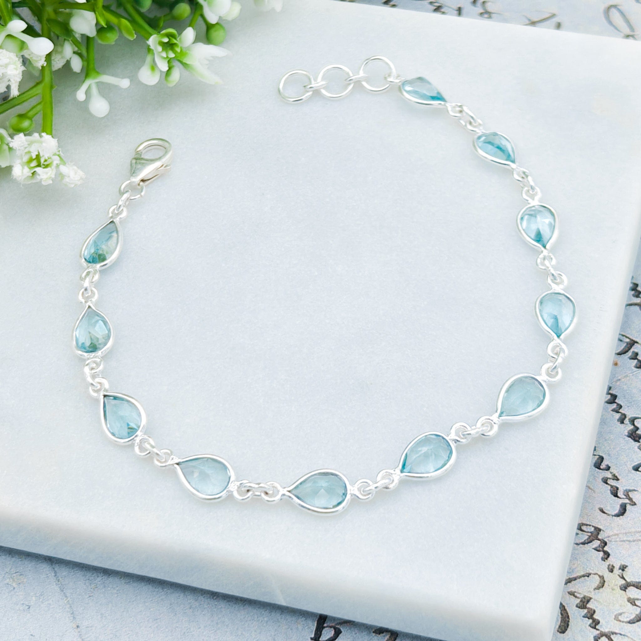 Hepburn and Hughes Blue Topaz Bracelet | 11 stones | November Birthstone | Sterling Silver