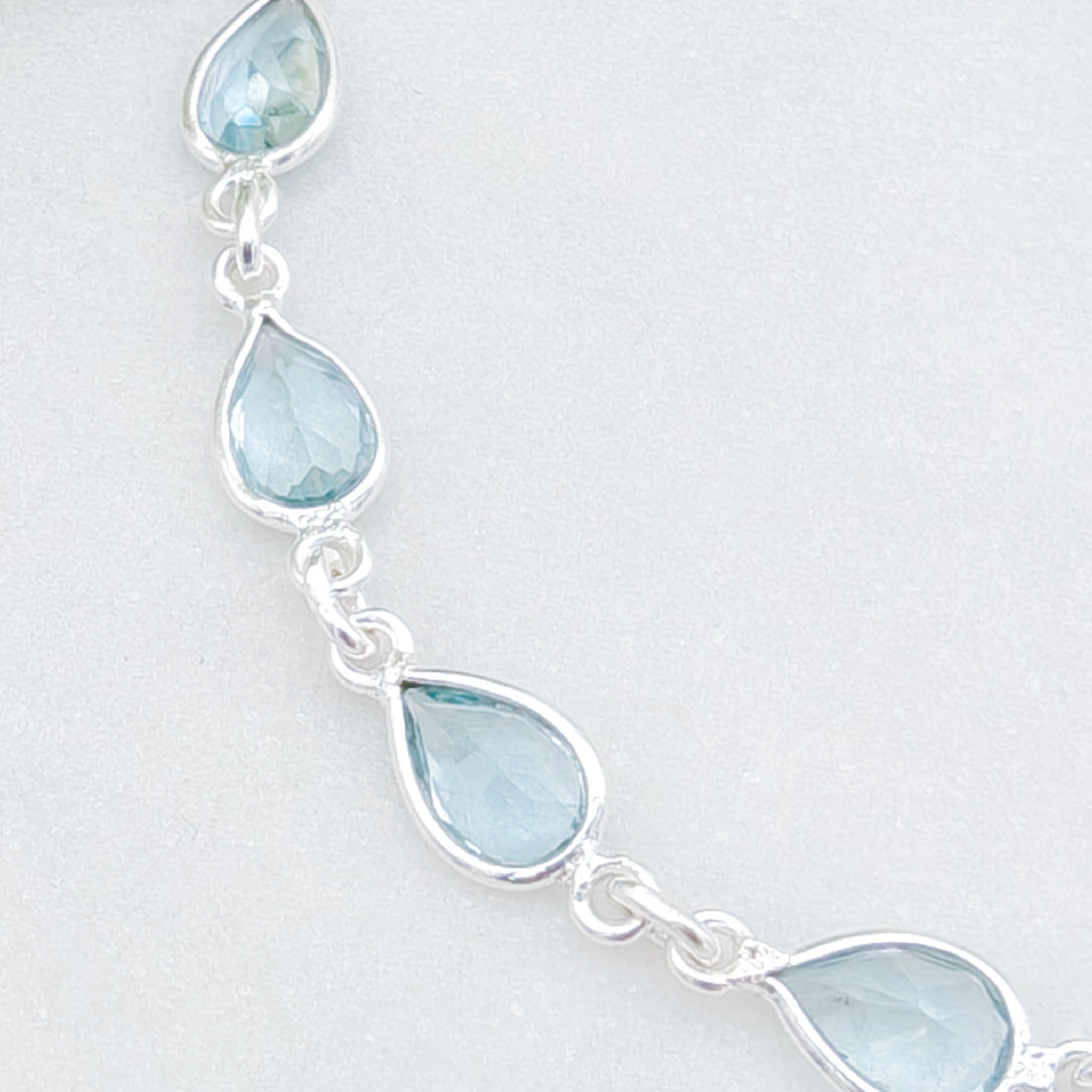 Hepburn and Hughes Blue Topaz Bracelet | 11 stones | November Birthstone | Sterling Silver