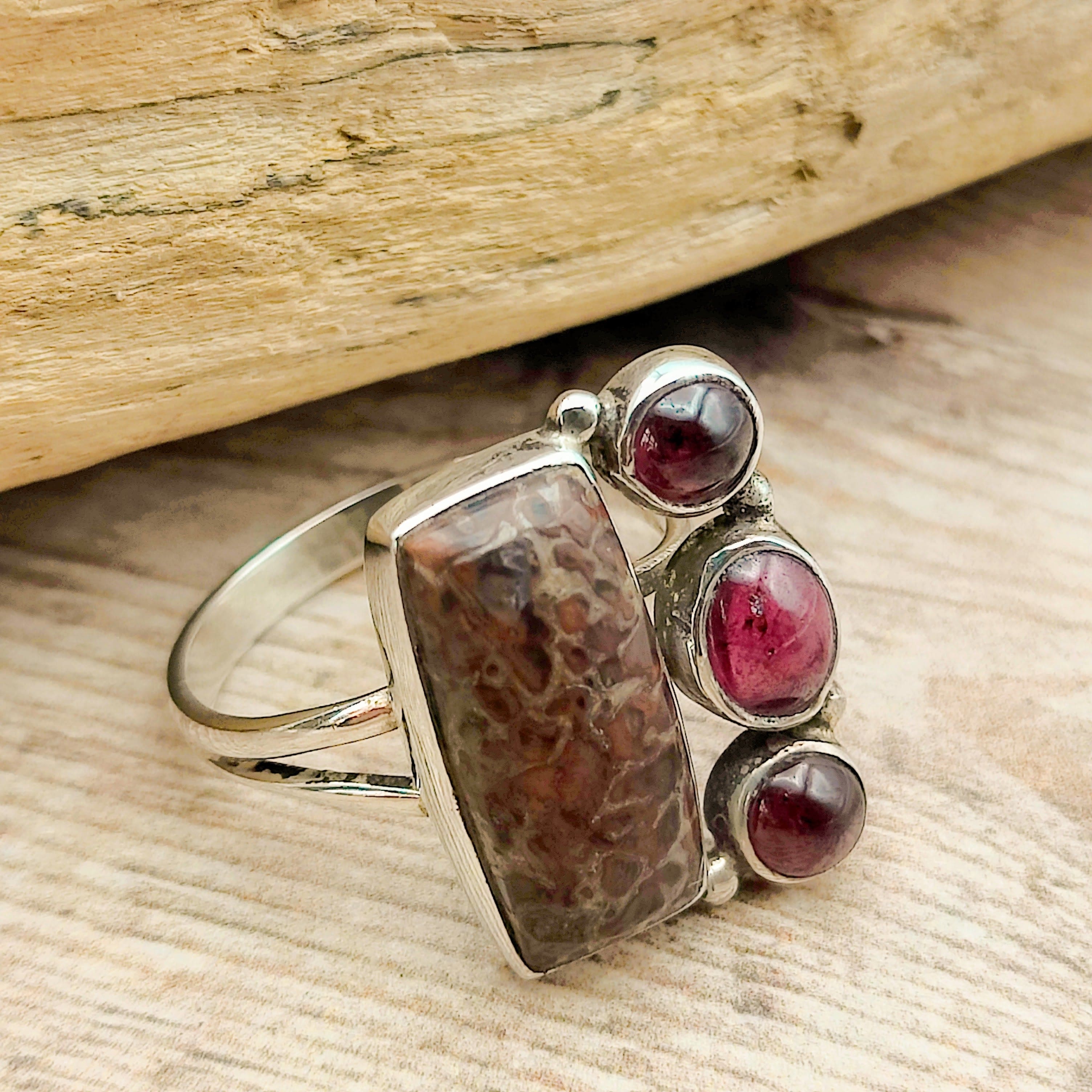 Hepburn and Hughes Dinosaur Fossil Ring | Brontosaurus Bone and Garnet | Sterling Silver