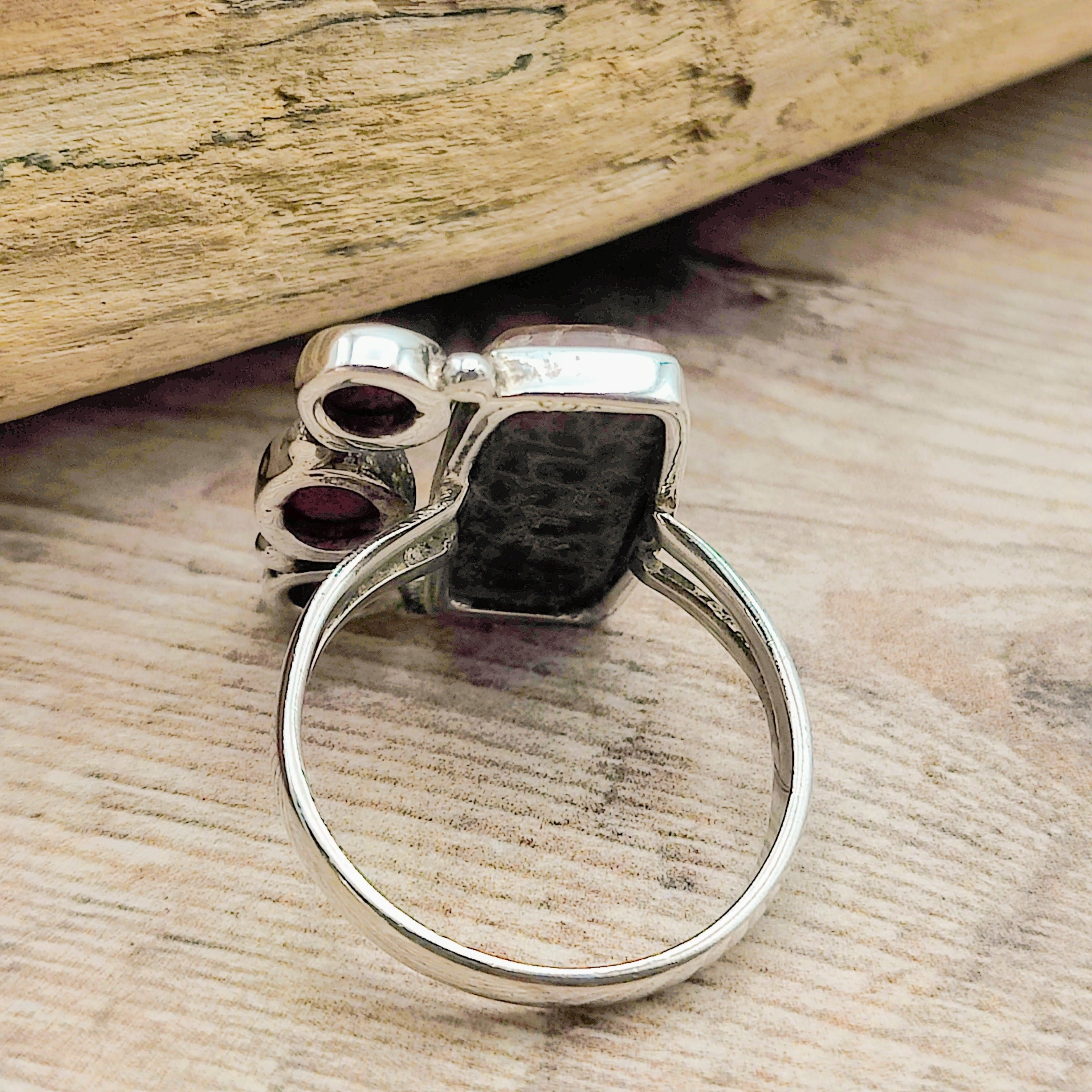 Hepburn and Hughes Dinosaur Fossil Ring | Brontosaurus Bone and Garnet | Sterling Silver