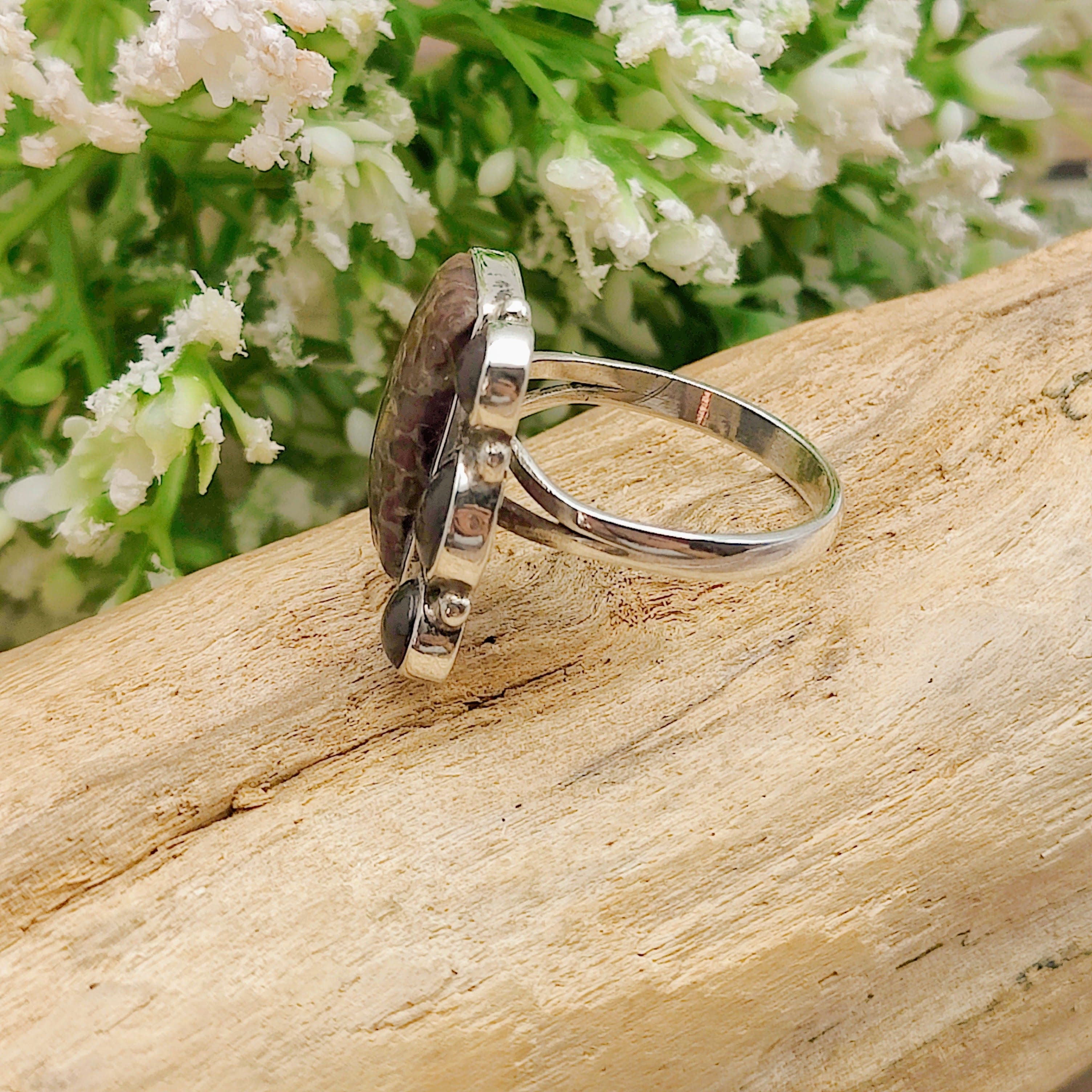 Hepburn and Hughes Dinosaur Fossil Ring | Brontosaurus Bone and Garnet | Sterling Silver