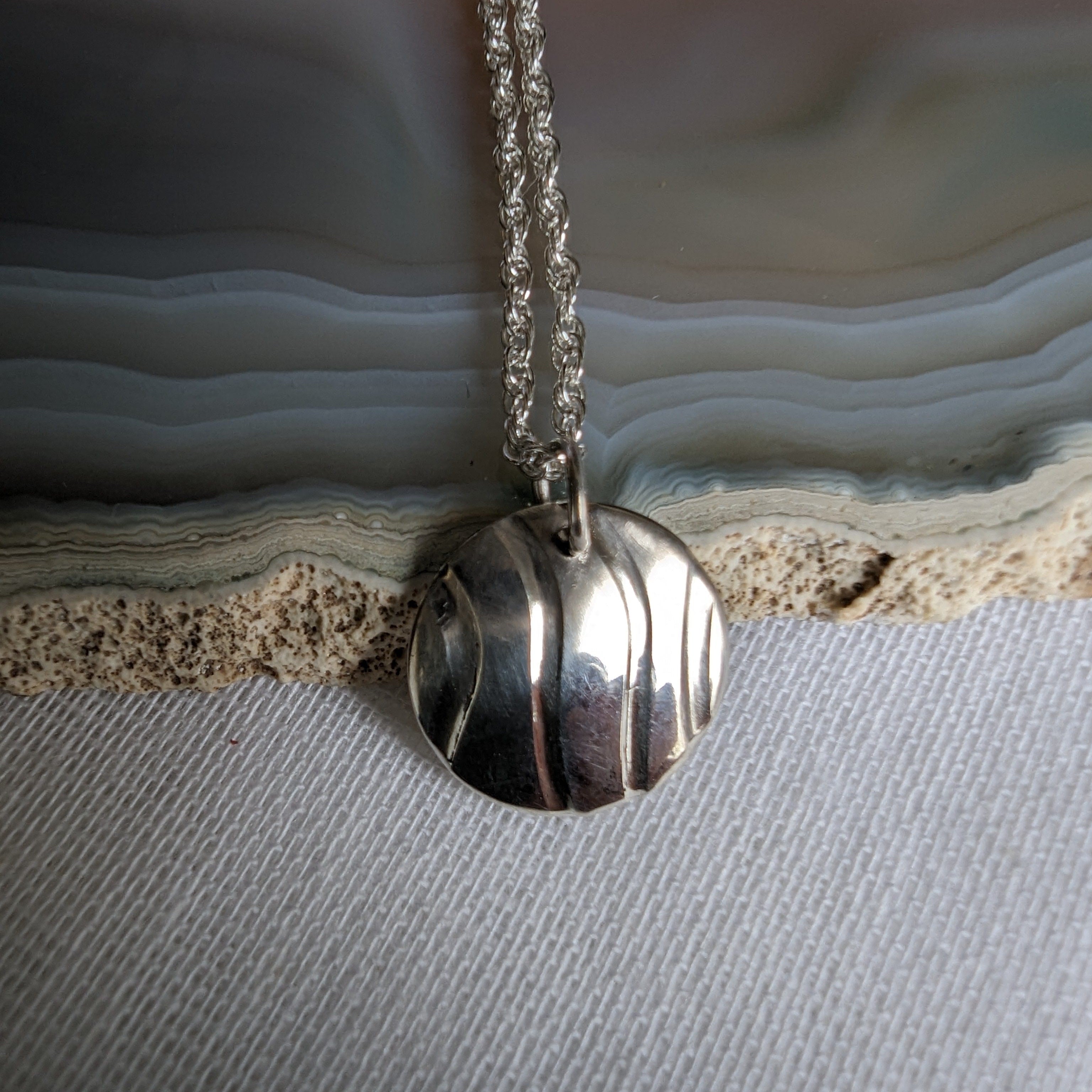 Dezanne Design Ecosilver Silver Circle Pendant with Wave Design