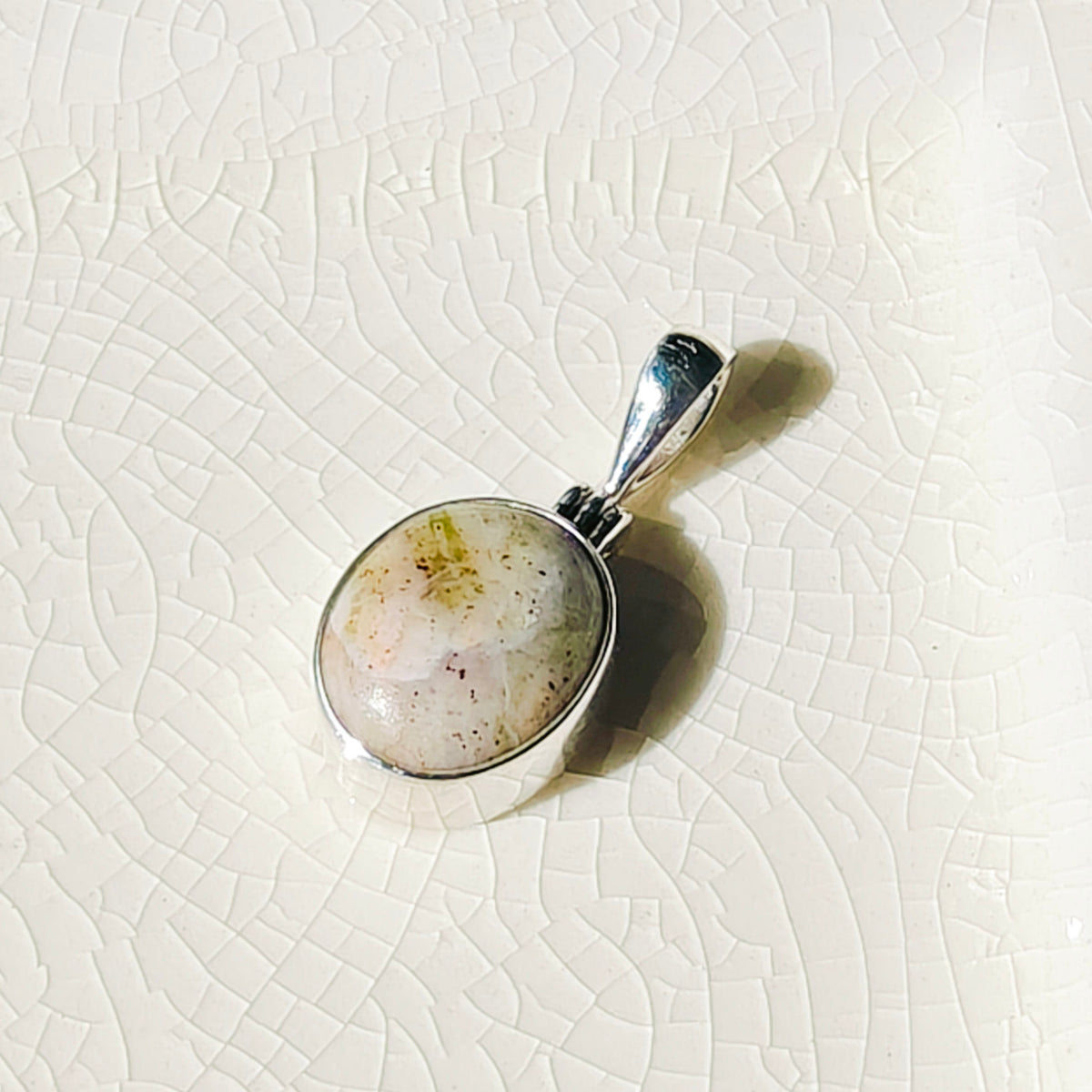 Hepburn and Hughes Isle of Skye Marble Pendant in Sterling Silver | Scottish Gift | 13mm Pink Tone Oval
