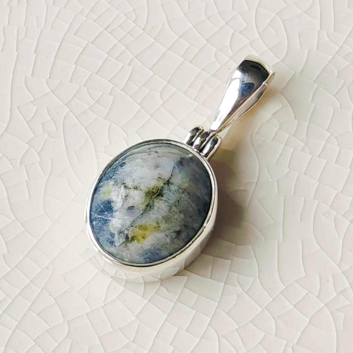 Hepburn and Hughes Isle of Skye Marble Pendant | Scottish Gift | 15mm Oval Grey Stone | Sterling Silver