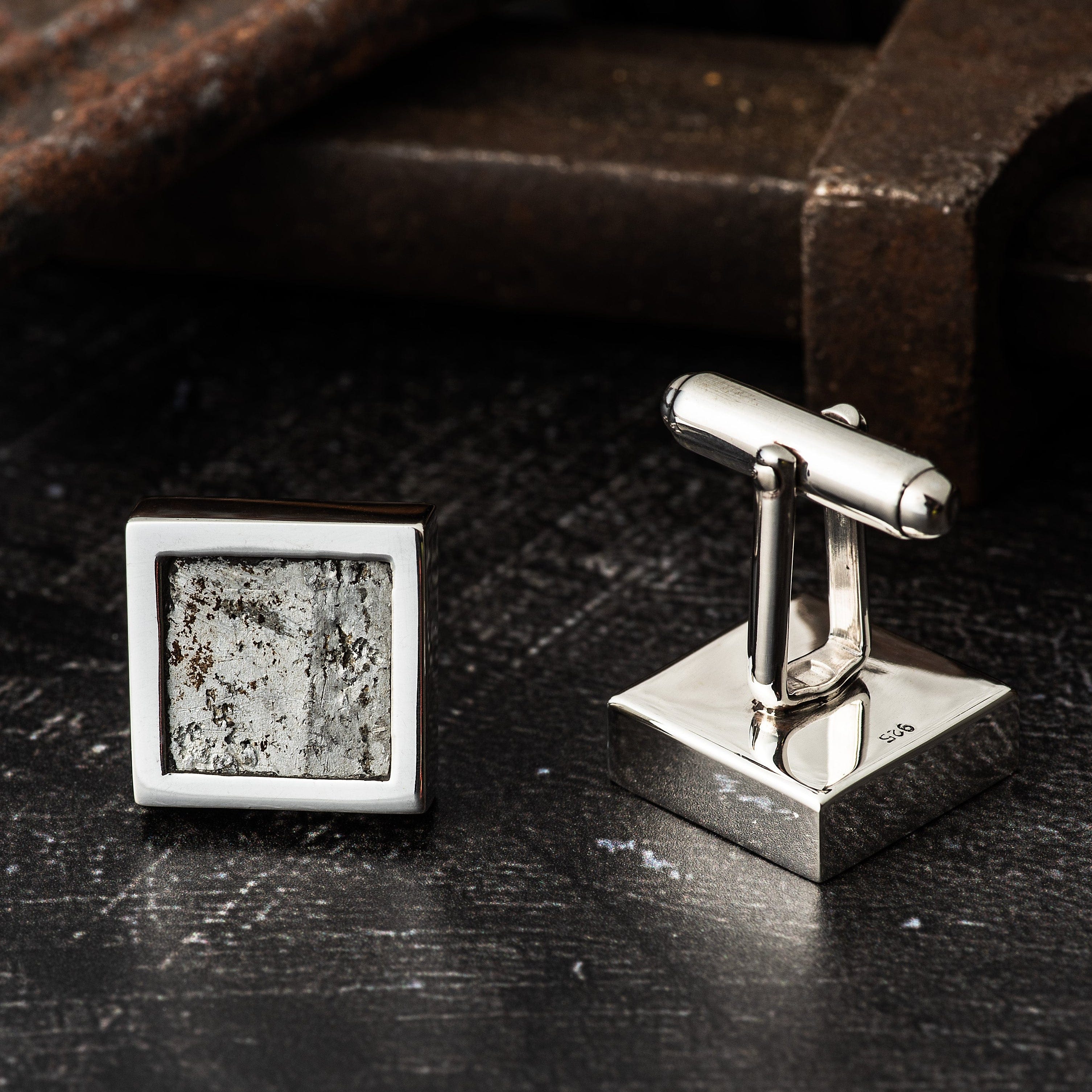 Handcrafted sterling silver cufflinks featuring genuine reclaimed WWII Lancaster Bomber aluminium, shown on a presentation box with Certificate of Authenticity