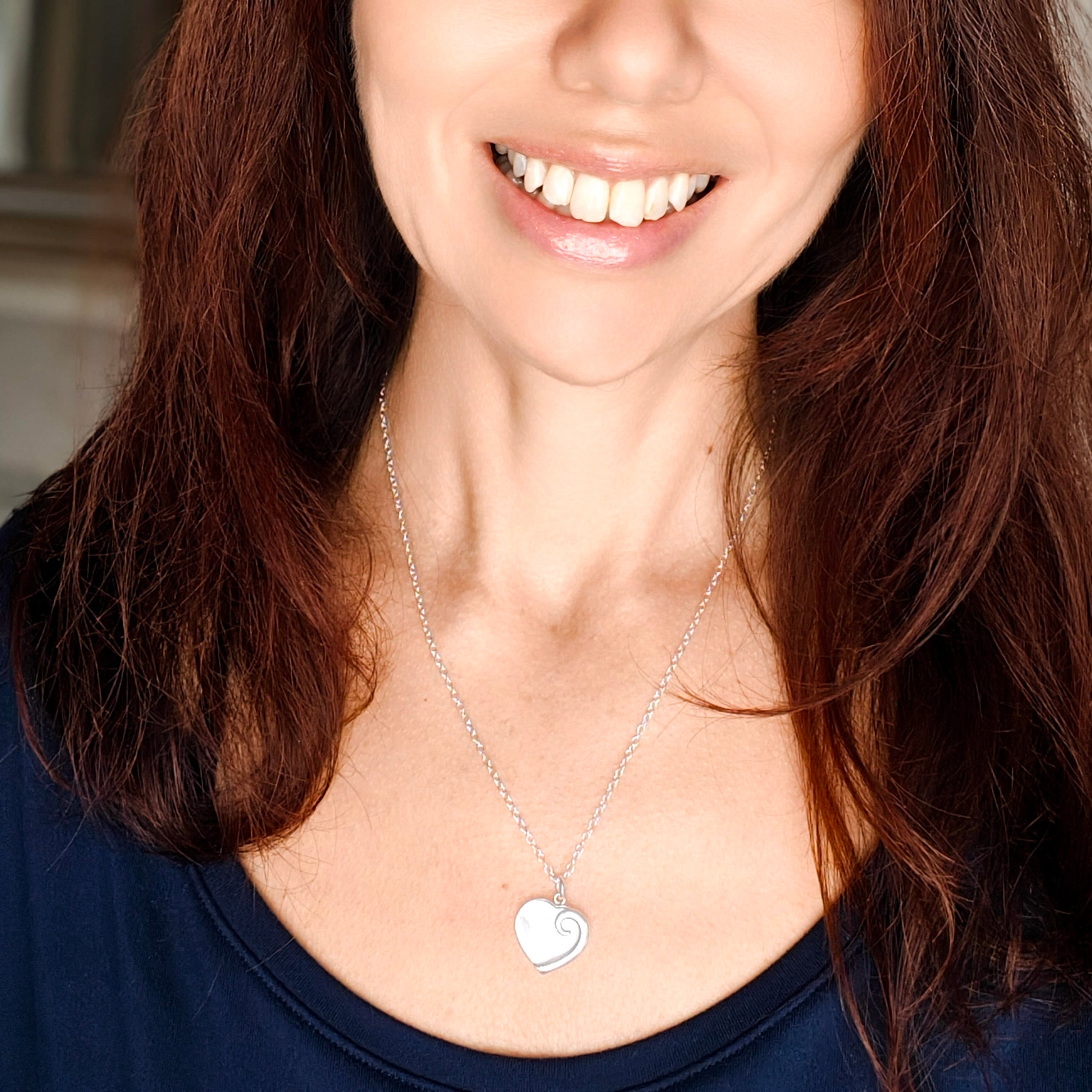 Hepburn and Hughes Mother of Pearl hanging heart pendant in sterling silver | June Birthday Gift