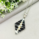 Hepburn and Hughes Seashell Pendant, Black medium diamond troca in Sterling Silver