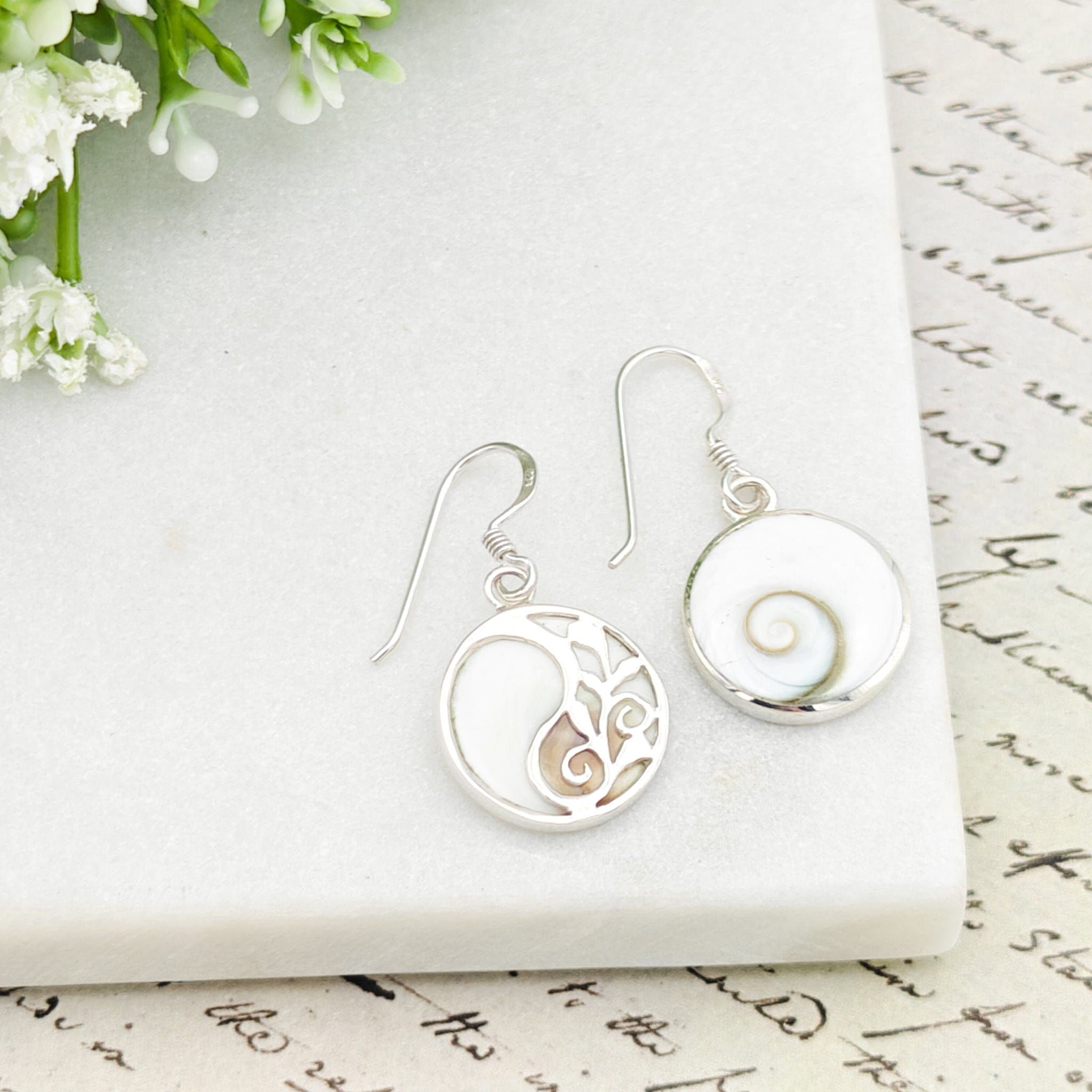 Hepburn and Hughes Shiva Eye Earrings | Yin and Yang Seashells | Circular | Sterling Silver