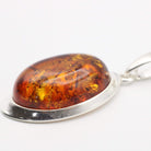 Hepburn and Hughes Baltic Amber Pendant, Oval in Sterling Silver