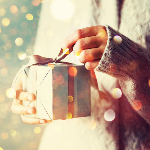 woman opening gift, Valentines Day