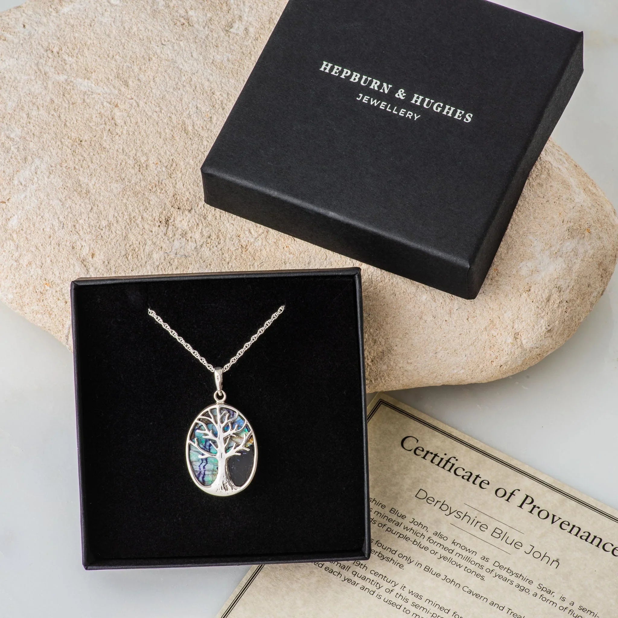 oval silver blue john necklace presented in a black gift box