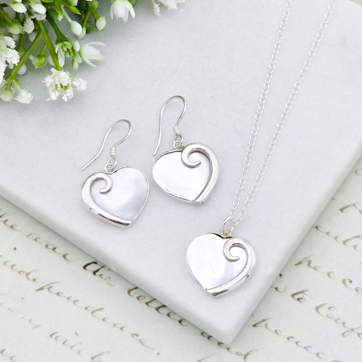 Hepburn and Hughes Mother of Pearl hanging heart pendant in sterling silver | June Birthday Gift