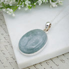 Lovely Aquamarine pendant, side angle showing silver band