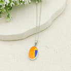 Hepburn and Hughes Art Deco Pendant | Clarice Cliff Wind Bells Pottery | 20mm Oval |  Sterling Silver