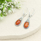 Hepburn and Hughes Baltic Amber Earrings, Oval with double frame in Sterling Silver