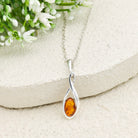 Hepburn and Hughes Baltic Amber Pendant | 20mm hanging Oval | Sterling Silver