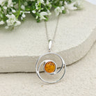 Hepburn and Hughes Baltic Amber Pendant | 22m Round Swirl | November Gift | Sterling Silver
