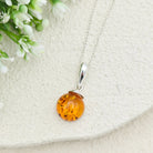 Hepburn and Hughes Baltic Amber Pendant | Cognac or Green | Circular | Sterling Silver