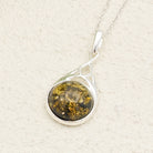 Hepburn and Hughes Baltic Amber Pendant | Cognac or Green | Circular | Sterling Silver