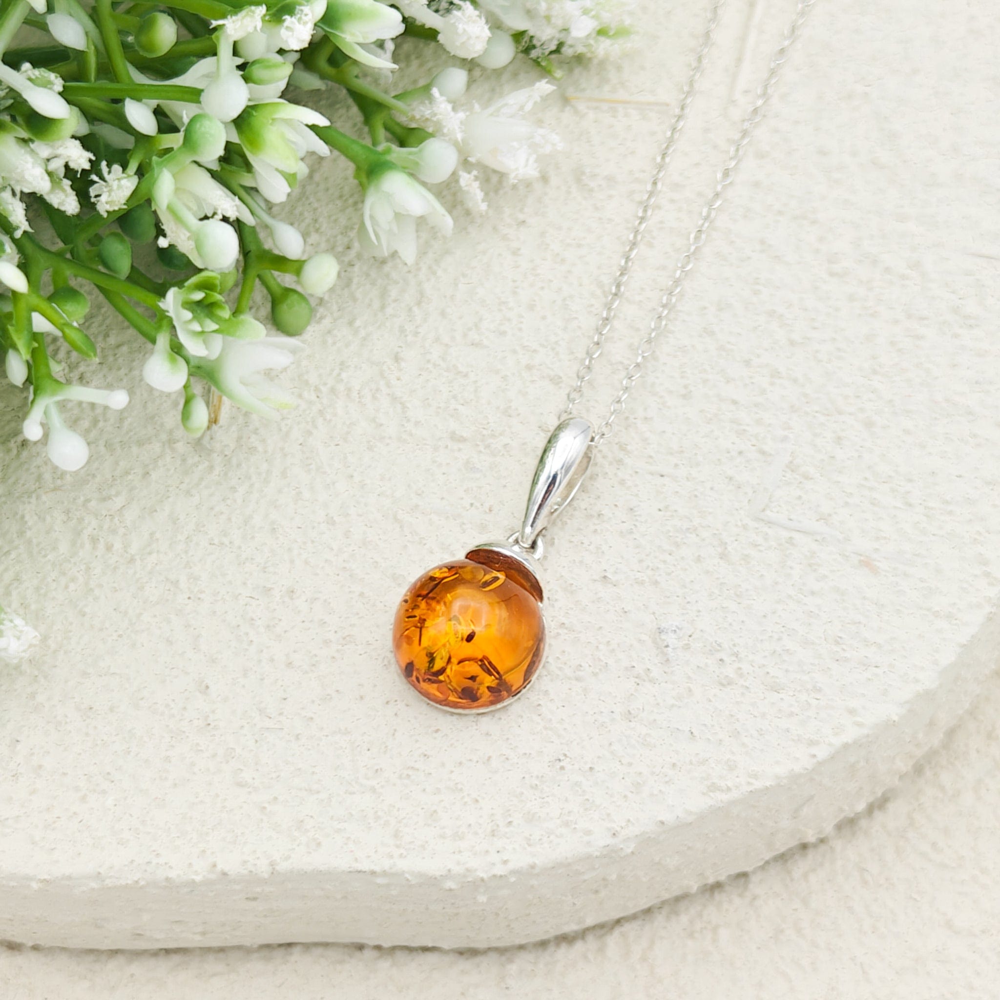 Hepburn and Hughes Baltic Amber Pendant | Cognac or Green | Circular | Sterling Silver