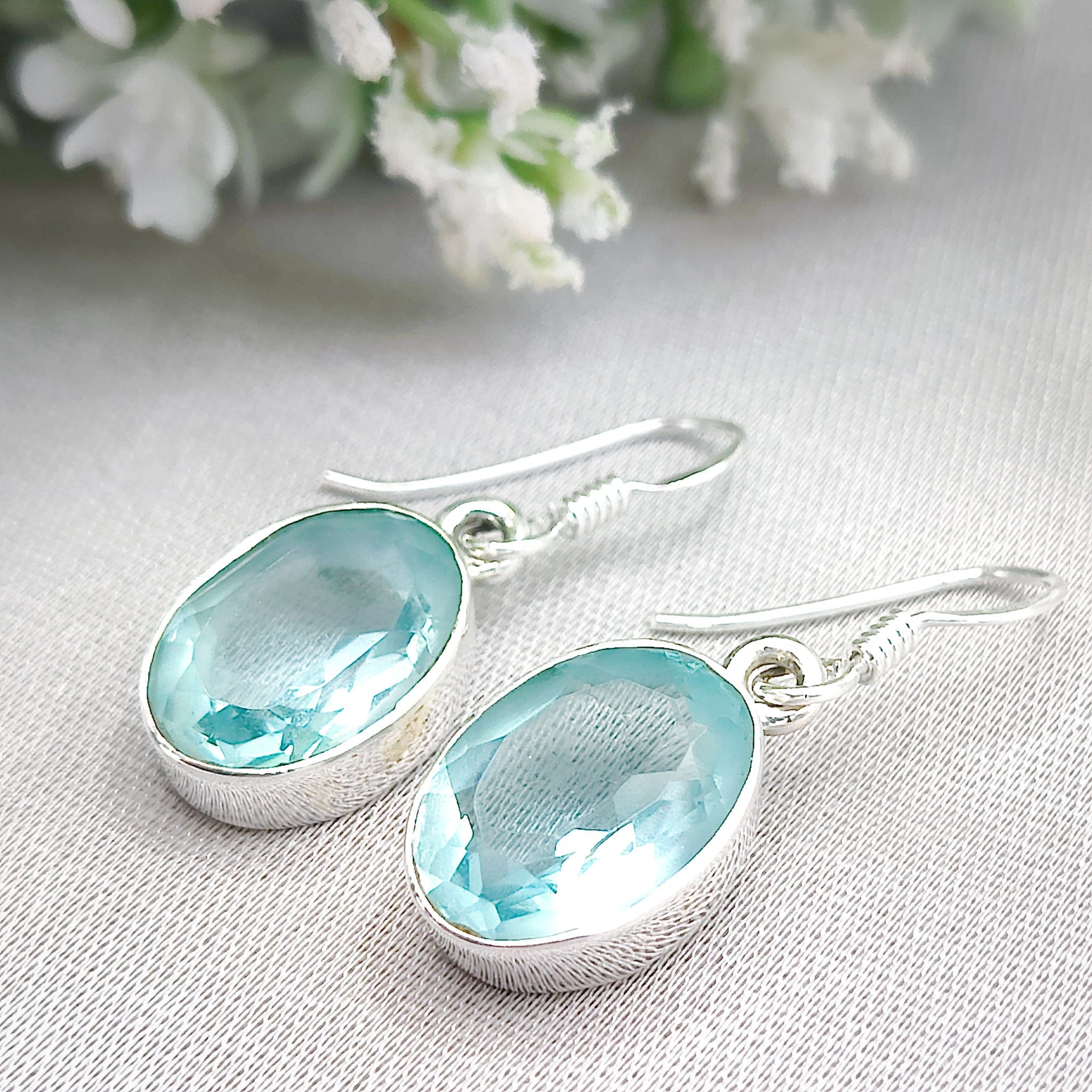 Hepburn and Hughes Blue Topaz Earrings | 15mm Oval | November Birthstone  | Sterling Silver