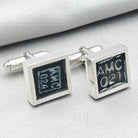 chinook cufflinks on pale background with AMC text visible from instrument panel