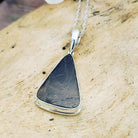 Hepburn and Hughes Dinosaur Bone Pendant | Fossilised Iguanodon | 26mm Triangle | Sterling Silver