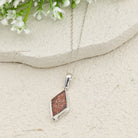 Hepburn and Hughes Dinosaur Egg Shell Pendant | Diamond Shape | Dinosaur Fossil Gift | Sterling Silver