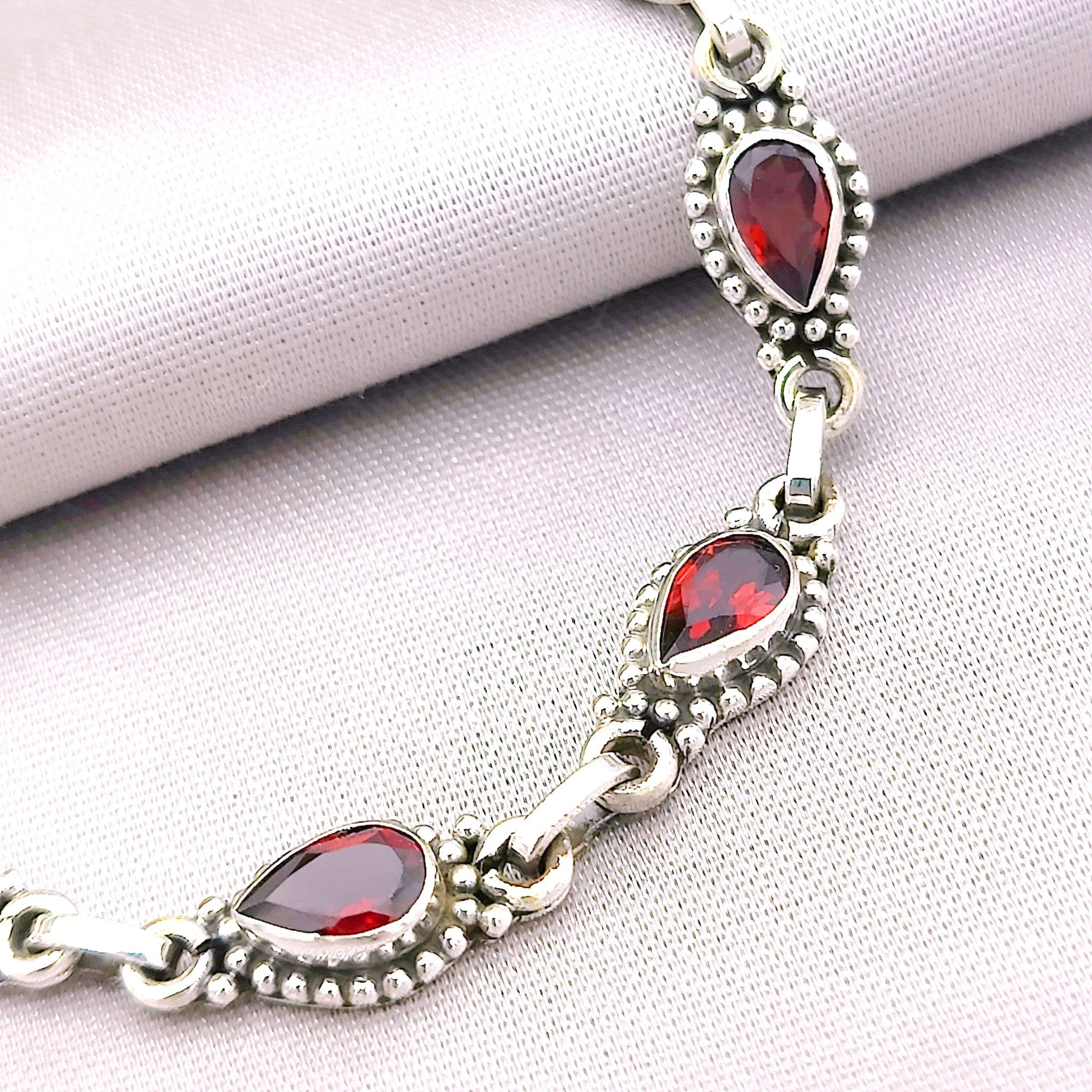 Hepburn and Hughes Garnet Gemstone Bracelet | 7 Teardrops | 2nd Anniversary Gift | Sterling Silver