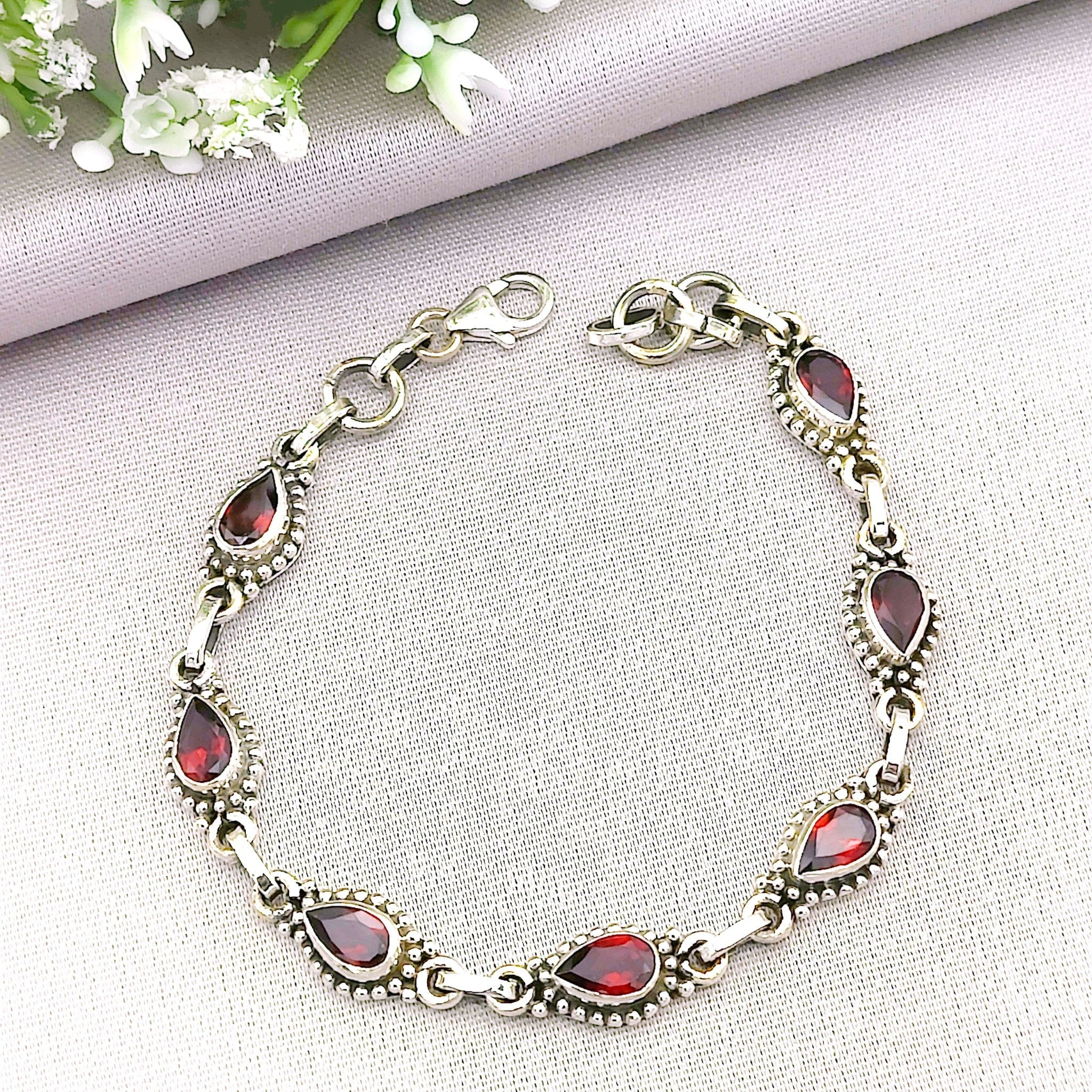 Hepburn and Hughes Garnet Gemstone Bracelet | 7 Teardrops | 2nd Anniversary Gift | Sterling Silver