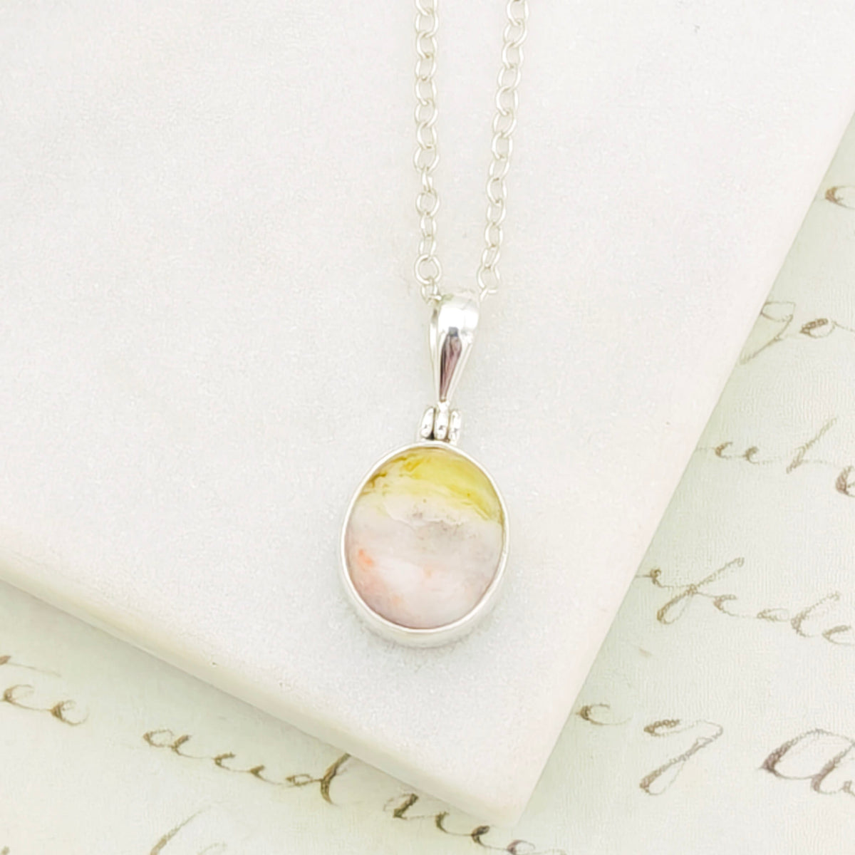 Hepburn and Hughes Isle of Skye Marble Pendant in Sterling Silver | Scottish Gift | 13mm Pink Tone Oval