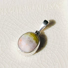 Hepburn and Hughes Isle of Skye Marble Pendant in Sterling Silver | Scottish Gift | 13mm Pink Tone Oval