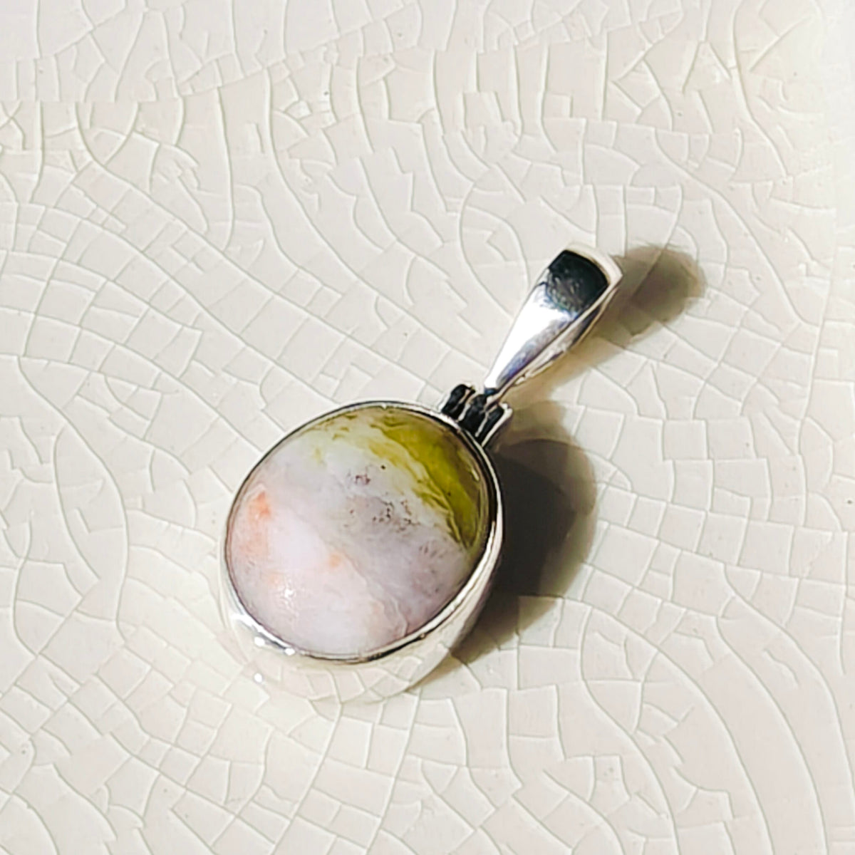 Hepburn and Hughes Isle of Skye Marble Pendant in Sterling Silver | Scottish Gift | 13mm Pink Tone Oval