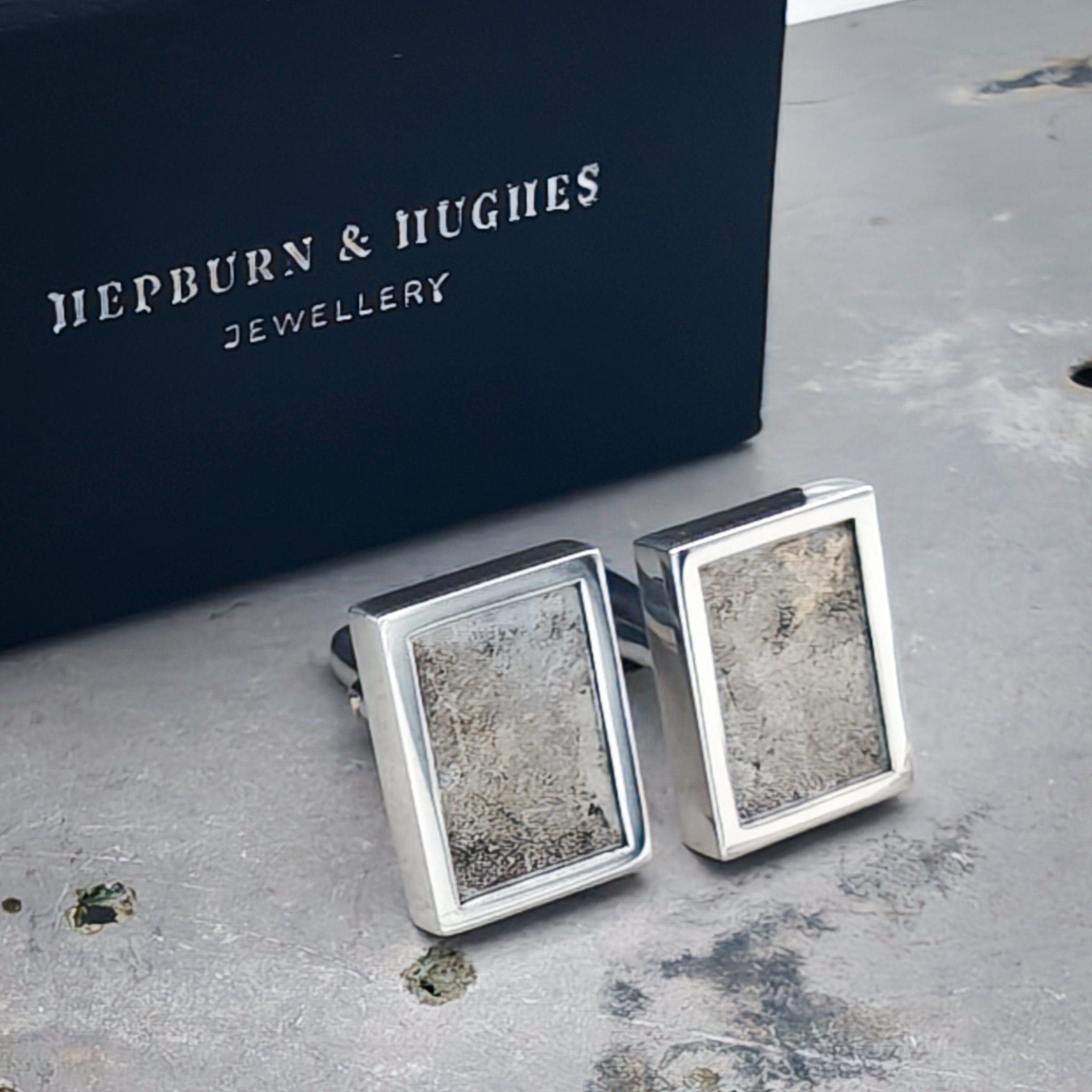 Handcrafted sterling silver cufflinks featuring genuine reclaimed WWII Lancaster Bomber aluminium, shown on a presentation box with Certificate of Authenticity