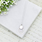 Hepburn and Hughes Mother of Pearl circle pendant in sterling silver | June Birthday Gift