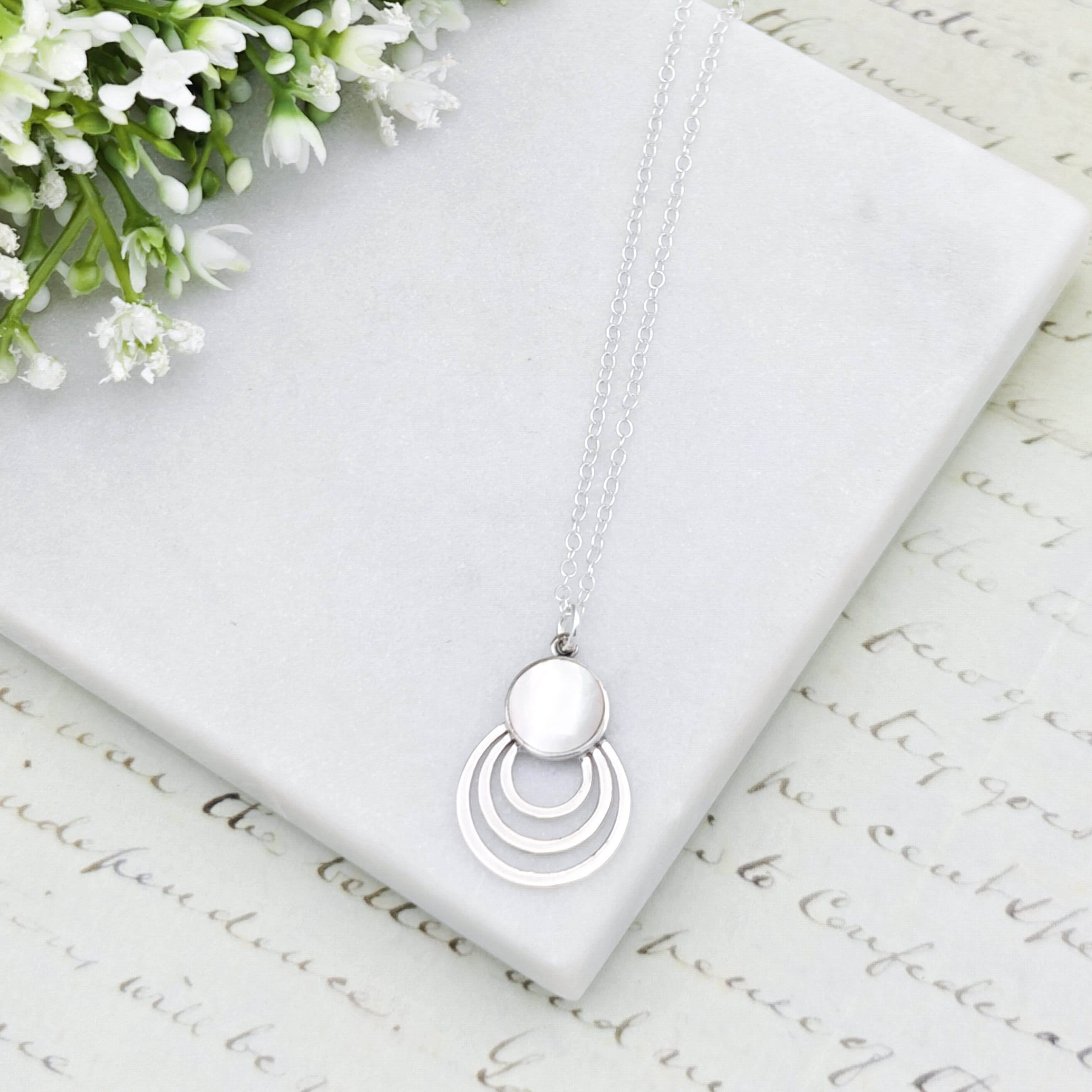 Hepburn and Hughes Mother of Pearl circle pendant in sterling silver | June Birthday Gift
