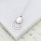 Hepburn and Hughes Mother of Pearl circle pendant in sterling silver | June Birthday Gift