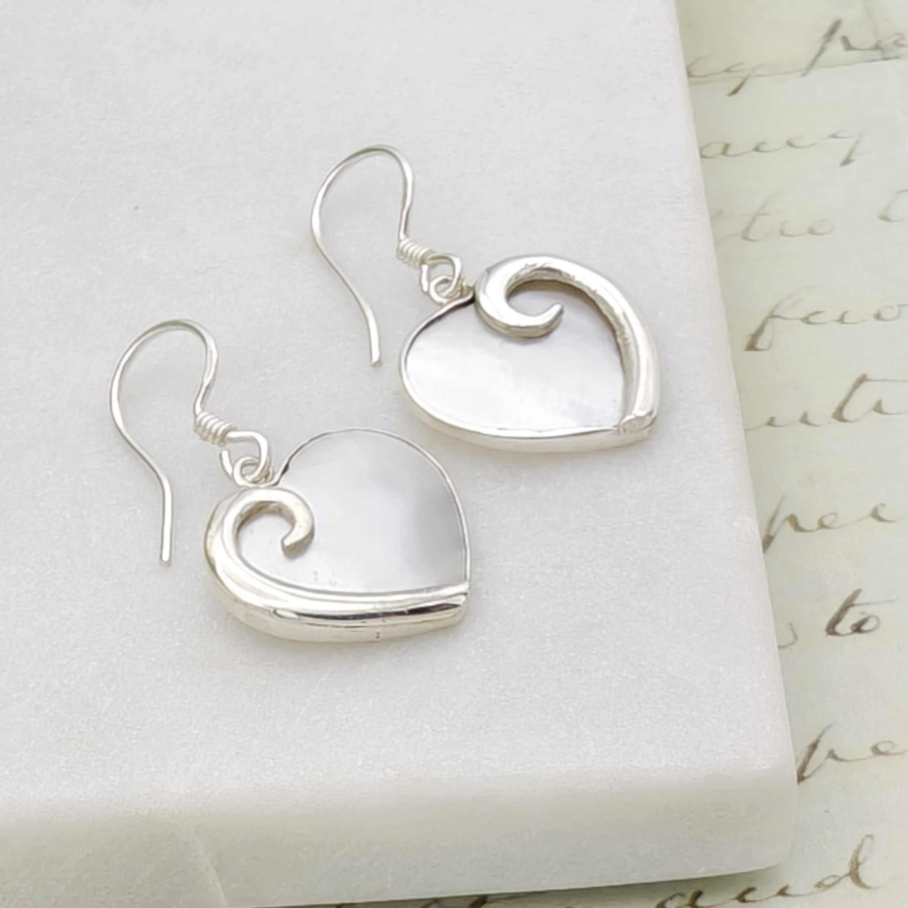 Hepburn and Hughes Mother of Pearl Hanging Heart Earrings in Sterling Silver | June Gift
