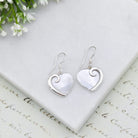 Hepburn and Hughes Mother of Pearl Hanging Heart Earrings in Sterling Silver | June Gift