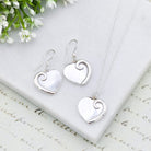 Hepburn and Hughes Mother of Pearl hanging heart pendant in sterling silver | June Birthday Gift