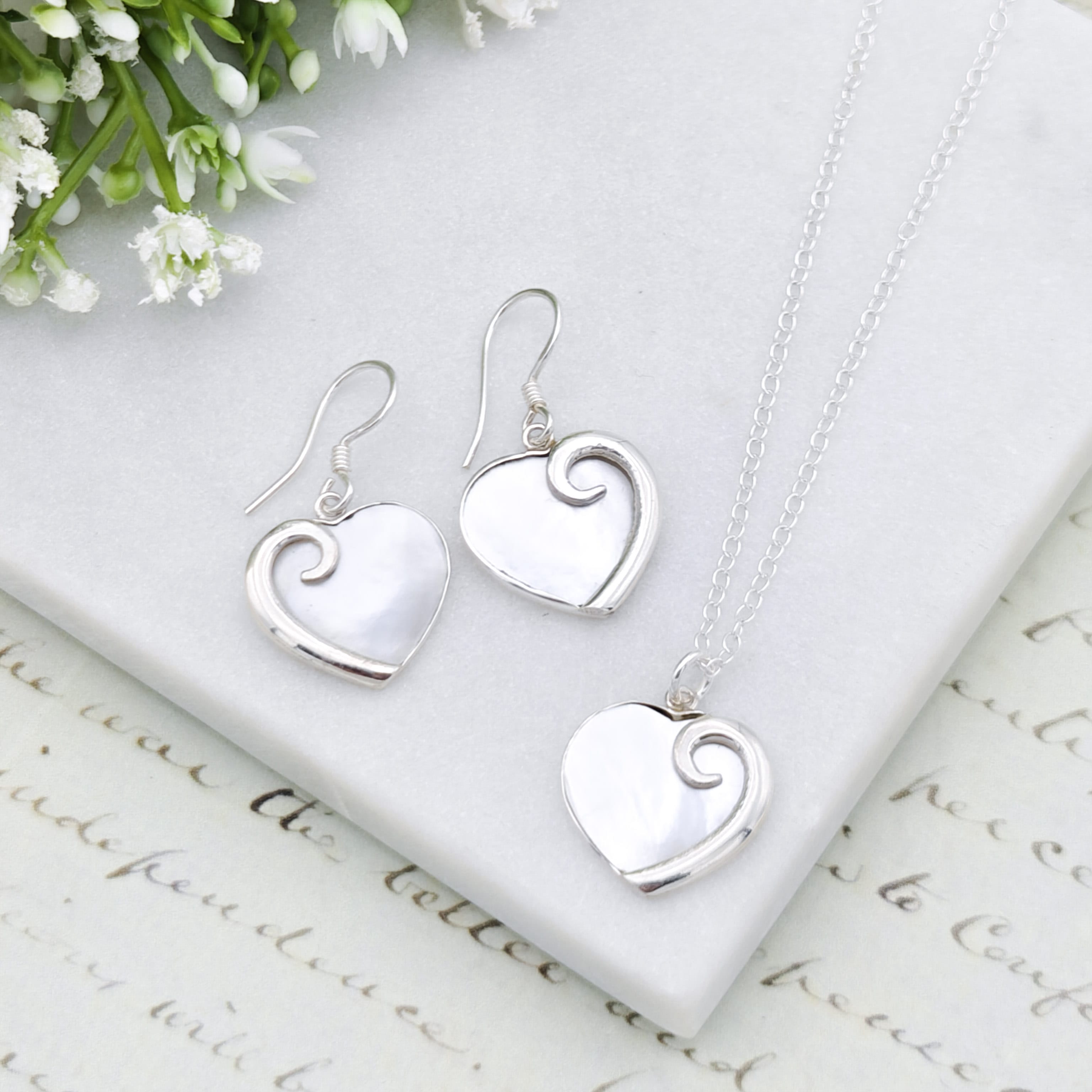 Hepburn and Hughes Mother of Pearl hanging heart pendant in sterling silver | June Birthday Gift