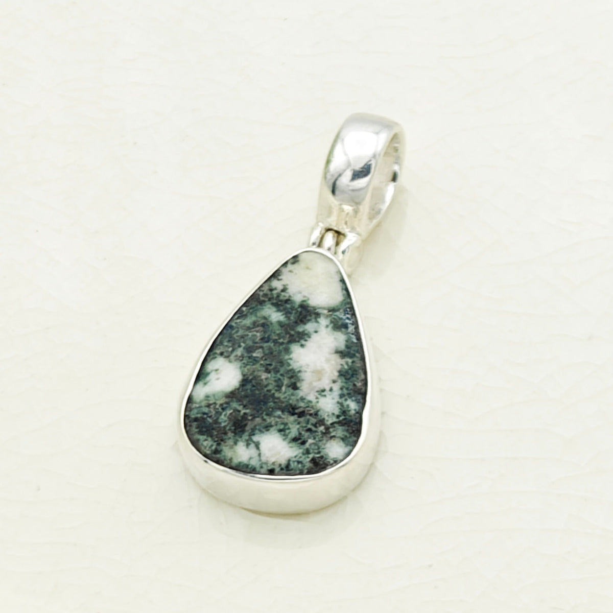 Hepburn and Hughes Preseli Bluestone Necklace | "Stonehenge" Spiritual Gift | Curved Triangle | Sterling Silver