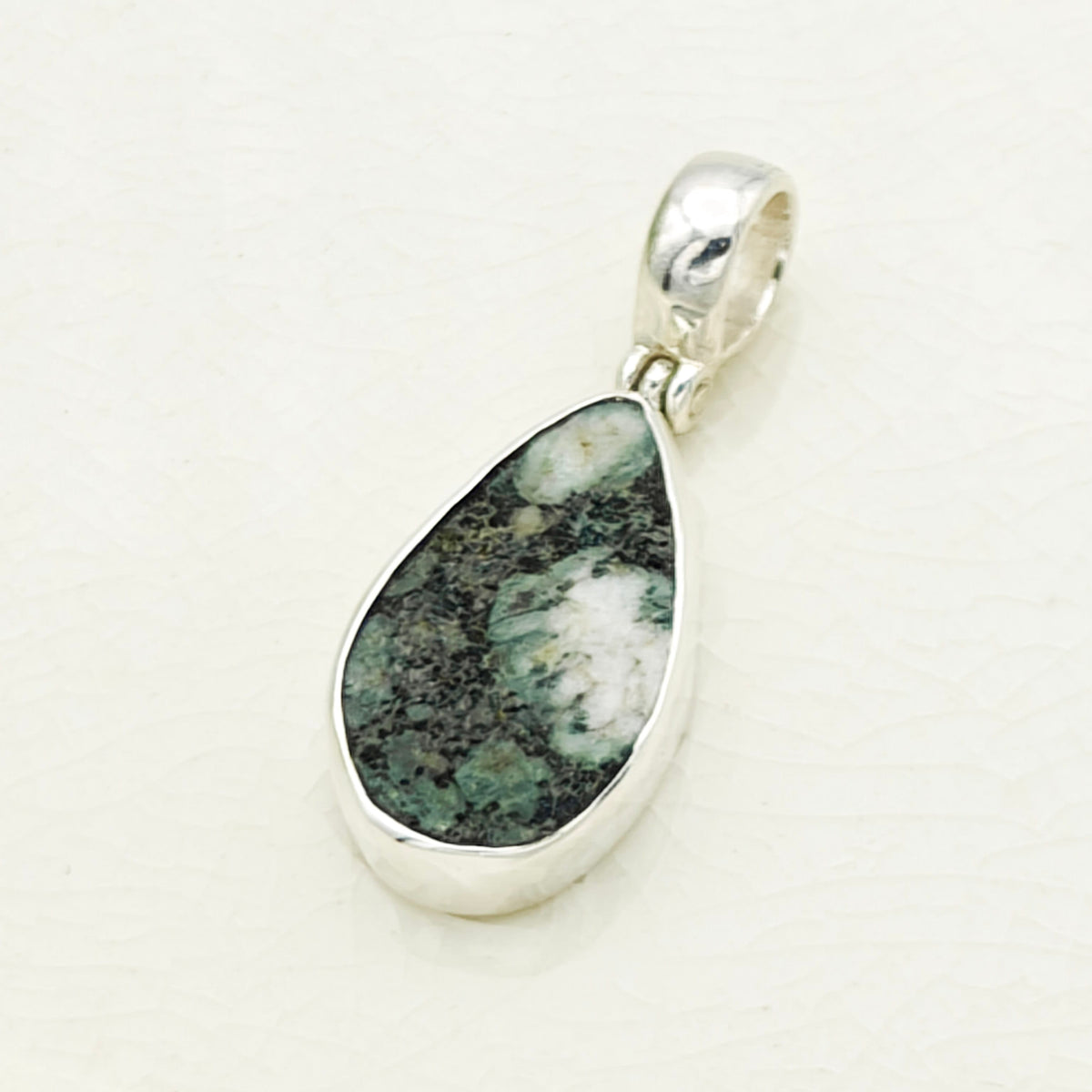 Hepburn and Hughes Preseli Bluestone Necklace | "Stonehenge" Spiritual Gift | Curved Triangle | Sterling Silver