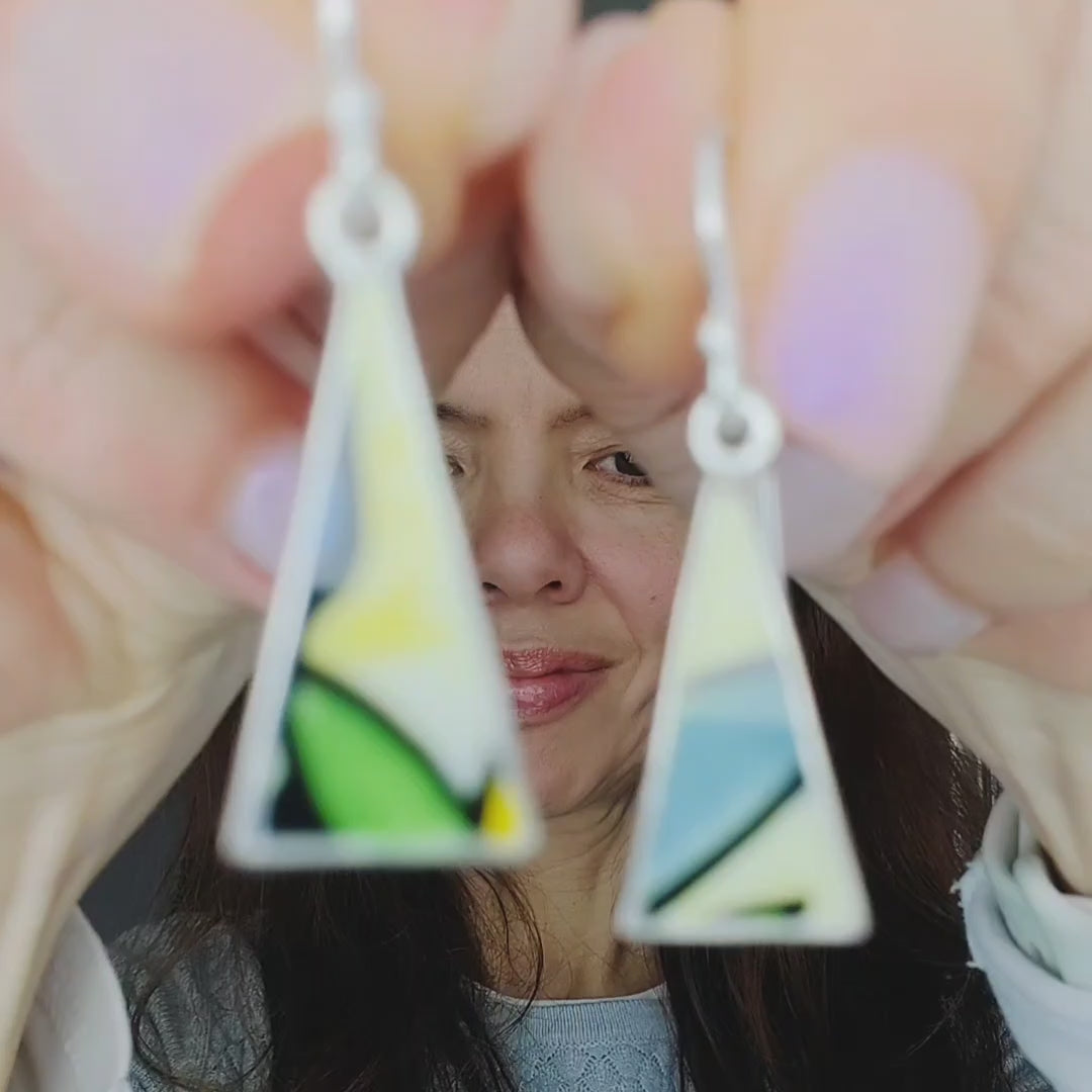Video of Clarice Cliff earrings showing their size and what they look like being worn
