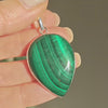 Video of teardrop shaped Malachite Pendant in the sunshine
