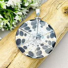 Hepburn and Hughes Seashell Pendant,  Black Medium Circle Troca in Sterling Silver